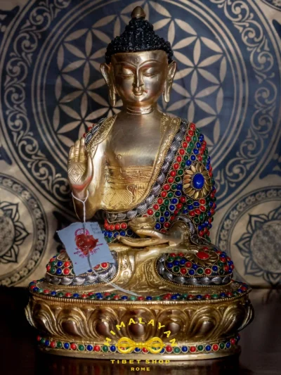 Statua del Buddha Shakyamuni in Dhyana Mudra, simbolo di meditazione, equilibrio e illuminazione spirituale, realizzata in ottone tibetano artigianale.
